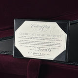 Certificate of authenticity for a Martin guitar on a dark background