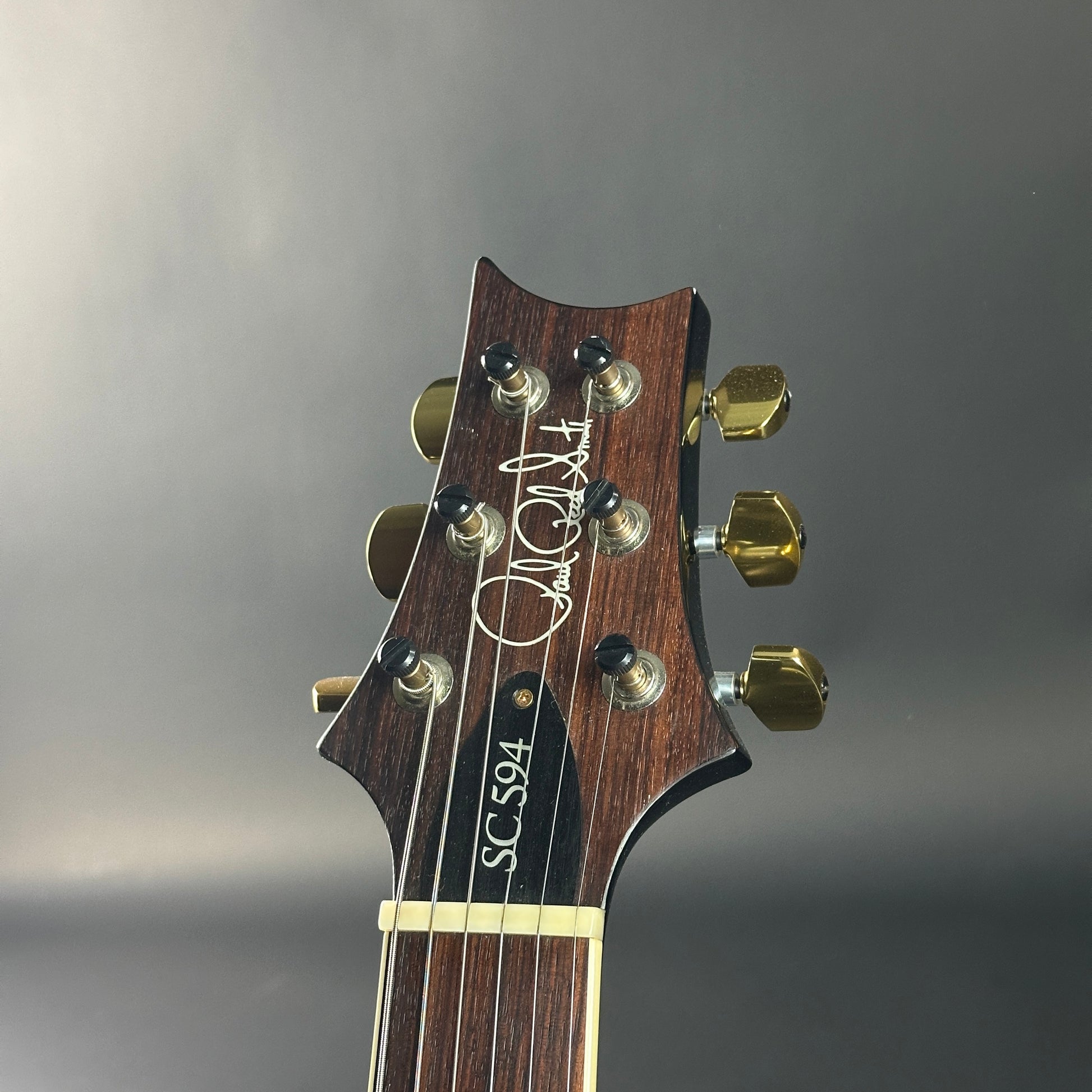 Headstock of Used PRS SC594 McCarty Singlecut 10-Top Smokeburst.