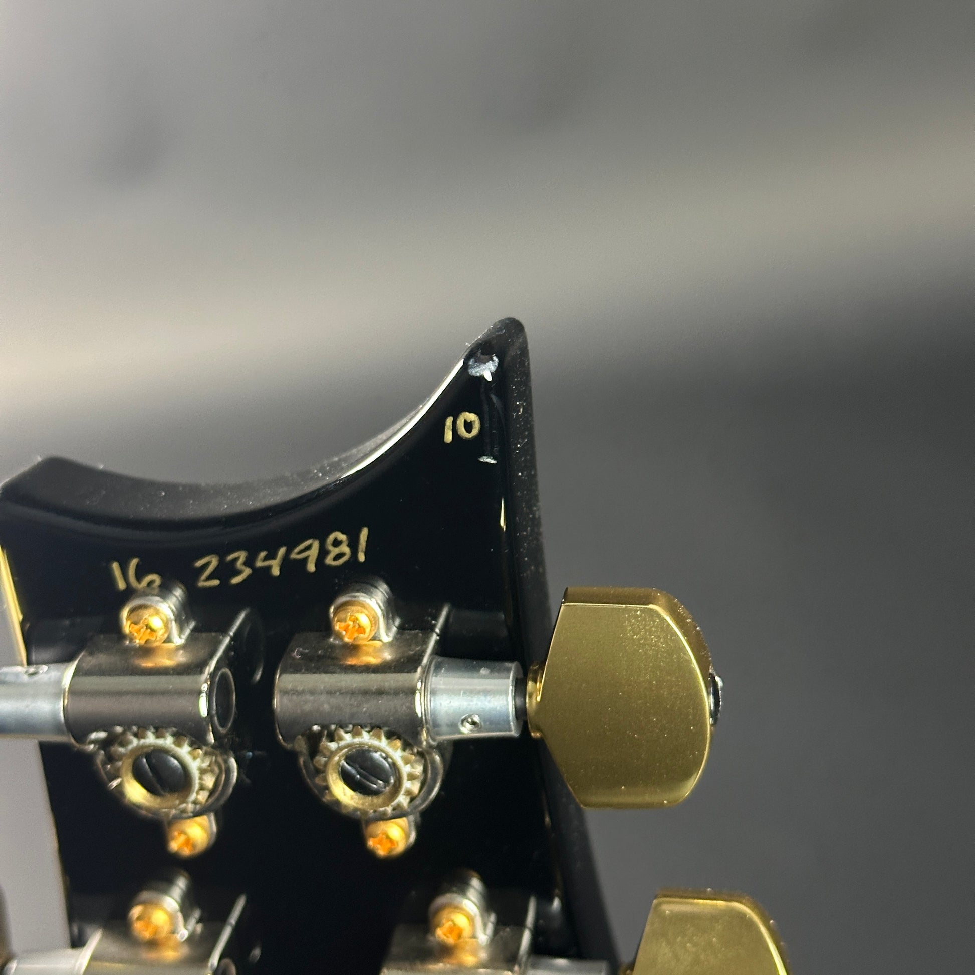 Wear on headstock of Used PRS SC594 McCarty Singlecut 10-Top Smokeburst.