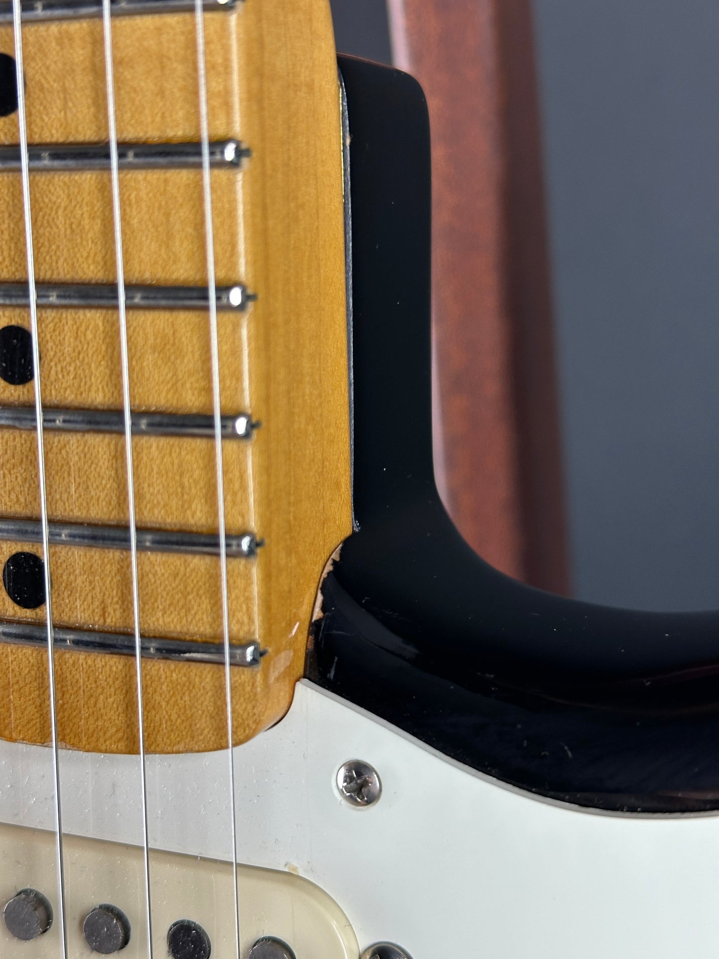 Wear on neck joint of Used Fender Eric Johnson Strat 2-Color Sunburst.