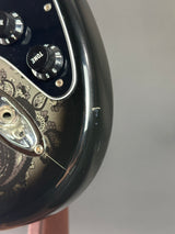 Wear on body of Used Fender FSR Black Paisley Strat.