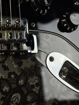 Wear on body of Used Fender FSR Black Paisley Strat.