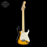 Electric guitar with a sunburst finish on a black background, featuring the Tone Shop logo.
