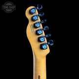 Guitar headstock with tuning pegs on a black background, featuring 'Tone Shop' logo.