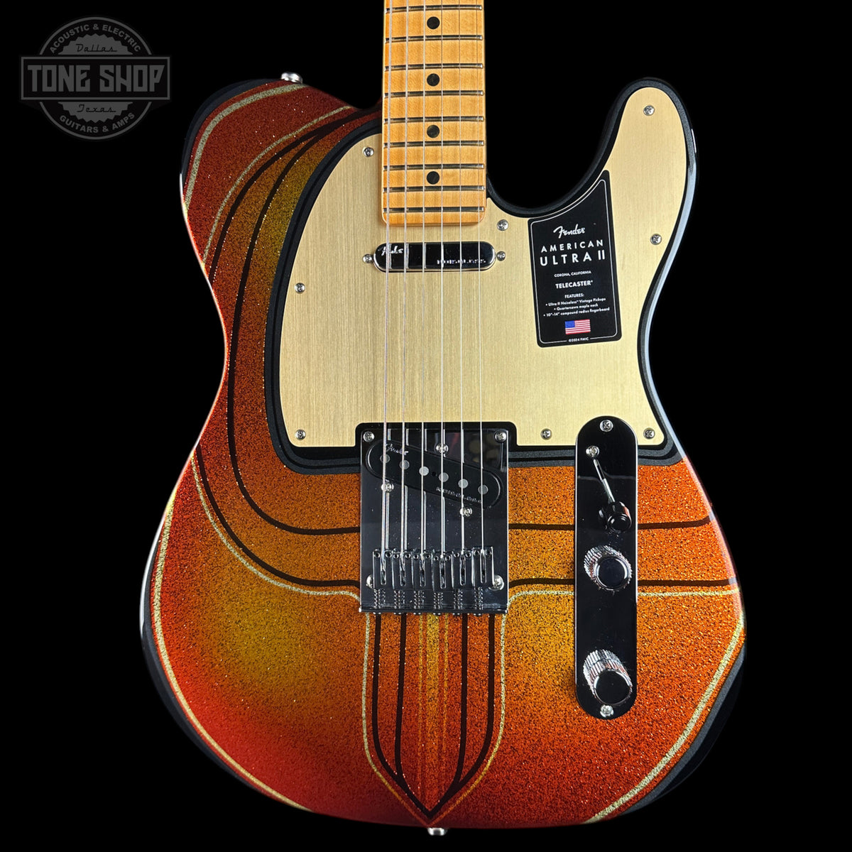 Electric guitar with a sunburst finish on a black background, featuring the Fender logo.