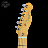 Close-up of a Fender Telecaster guitar headstock on a black background