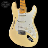 Front angle of Used 2018 Fender Eric Johnson Thinline Strat Vintage White.