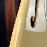 Ding on side of Used 2018 Fender Eric Johnson Thinline Strat Vintage White.