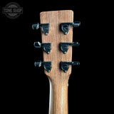 Guitar headstock with tuning pegs on a black background, featuring 'Tone Shop' logo.