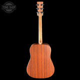 Back view of a wooden acoustic guitar on a black background with 'Tone Shop' logo.