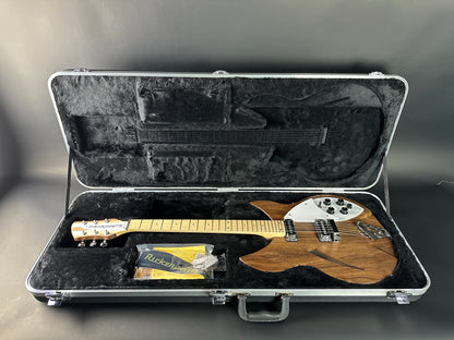 Electric guitar in a hard-shell case on a gray background