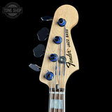 Fender Jazz Bass headstock with brand logo on a black background