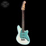 A Fender Telecaster electric guitar with a light blue and white gradient finish, shown against a solid black background. A Tone Shop watermark is visible in the top-left corner.