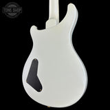 White electric guitar body on a black background with 'Tone Shop' logo.
