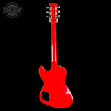 Red electric guitar on a black background with 'Tone Shop' logo.