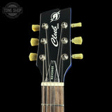 Guitar headstock with 'Club' series branding on a black background