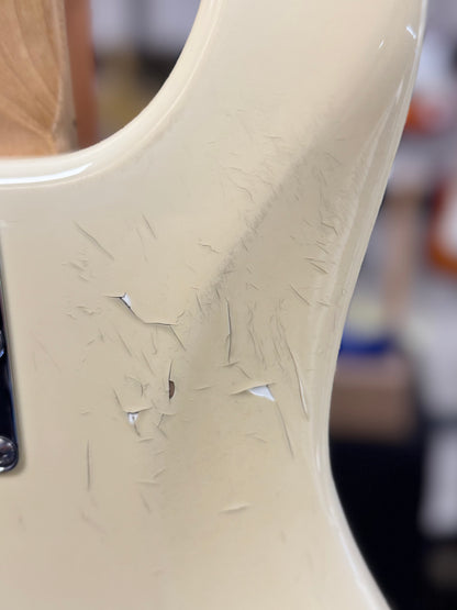 Close up of paint peel on Used 2007 Ernie Ball Music Man StingRay5 H White w/case TSS6510
