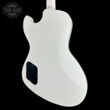 White electric guitar body with a visible brand logo in the corner.