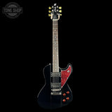 Electric guitar with black and red design on a white background