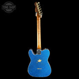Blue electric guitar with a visible brand logo on a black background