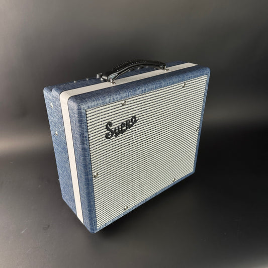 Vintage-style guitar amplifier with 'Supro' branding on a dark background