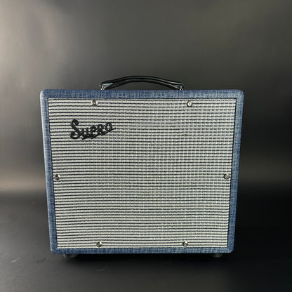 Vintage-style guitar amplifier with 'Suhr' branding on a dark background