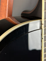 Close-up of a guitar's neck and body