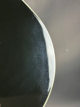 Close-up of a metallic object with a reflective surface