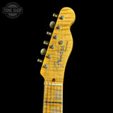 Fender Telecaster guitar headstock on a black background