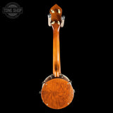 The back view of a wooden banjo with a glossy orange-brown finish, mounted on a black background with a Tone Shop watermark in the top left corner.