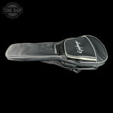 A black guitar gig bag with white piping and a white embroidered 'Gigbag' logo on the front pocket, shown against a solid black background.