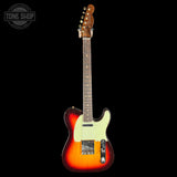 Electric guitar with a sunburst finish on a black background, featuring the Tone Shop logo.