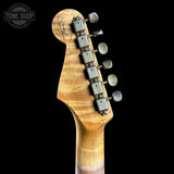 Guitar headstock with tuning pegs on a black background, featuring 'Tone Shop' logo.