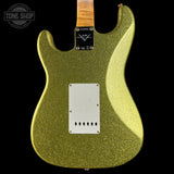 Green glitter electric guitar body with brand logo on a black background