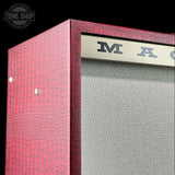 Close-up of a red crocodile-embossed speaker cabinet corner with a silver mesh grille and partial 'M A C' branding on a black background.