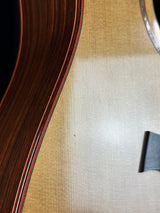 Close-up of a guitar's soundhole and body