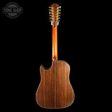 Back view of a wooden acoustic guitar with a brand logo in the corner.