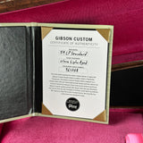 Gibson Custom Certificate of Authenticity on a red background