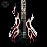 Guitar with flame design on a black background, featuring the Tone Shop logo.
