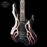 Black electric guitar with red flame design on a black background, featuring 'Tone Shop' logo.