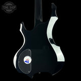 Black electric guitar with a visible brand logo on a black background