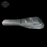 Guitar case with visible branding on a black background