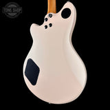 Guitar body with a 'Tone Shop' logo in the corner