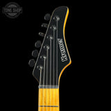 Guitar headstock with 'Kramer' branding on a black background