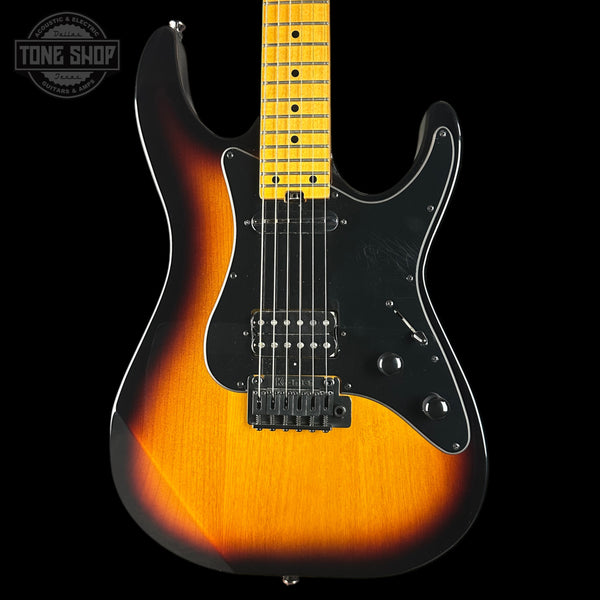 Electric guitar with a sunburst finish on a black background, featuring the Tone Shop logo.