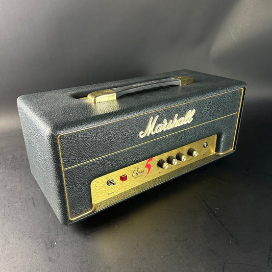 Marshall amplifier head on a dark background