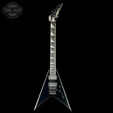 Black electric guitar on a black background with 'Tone Shop' logo.