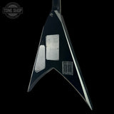 Black electric guitar body with 'Tone Shop' logo in the corner