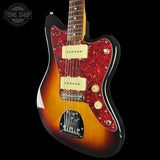 Electric guitar with a sunburst finish and red pickguard on a black background, featuring 'Tone Shop' branding.