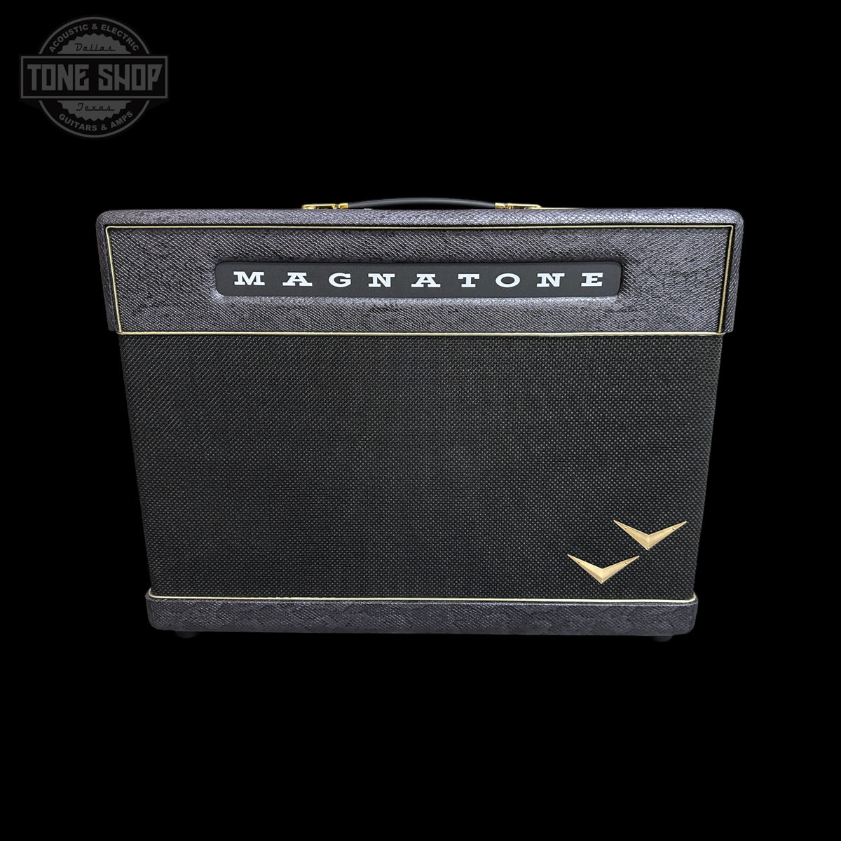 A vintage-style Magnatone guitar amplifier head against a solid black background, featuring a black textured grille, a black top panel with gold trim and the white 'MAGNATONE' logo, and a gold bird logo in the lower right corner.